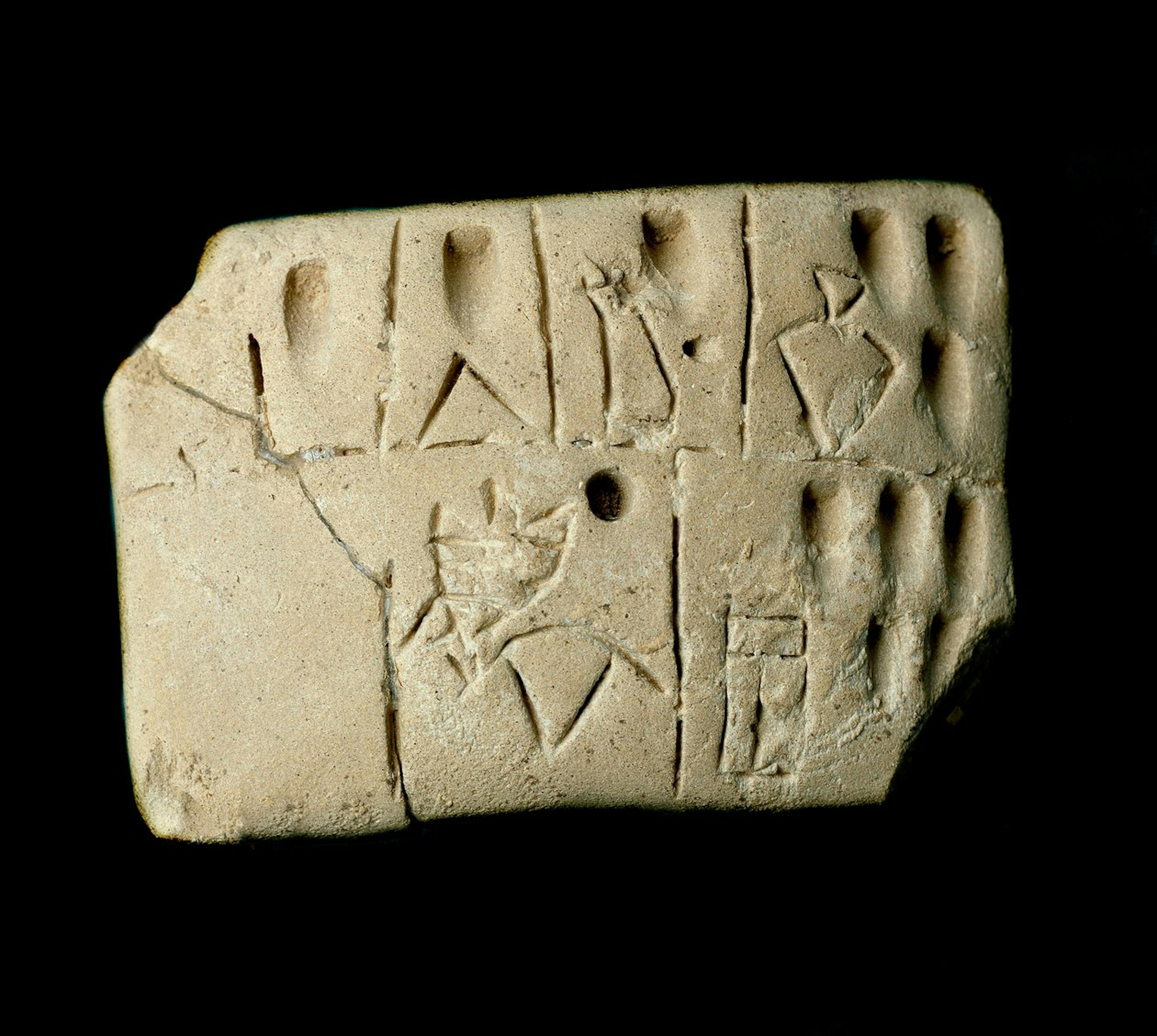 Tablette d’argile gravée en écriture cunéiforme