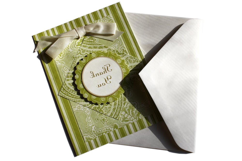 A handprinted Bengali invitaion card for marriage