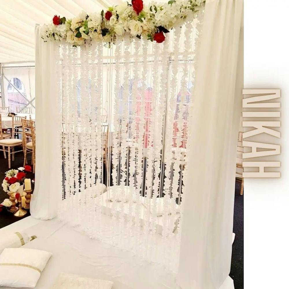 Pearly while Bengali wedding stage decoration