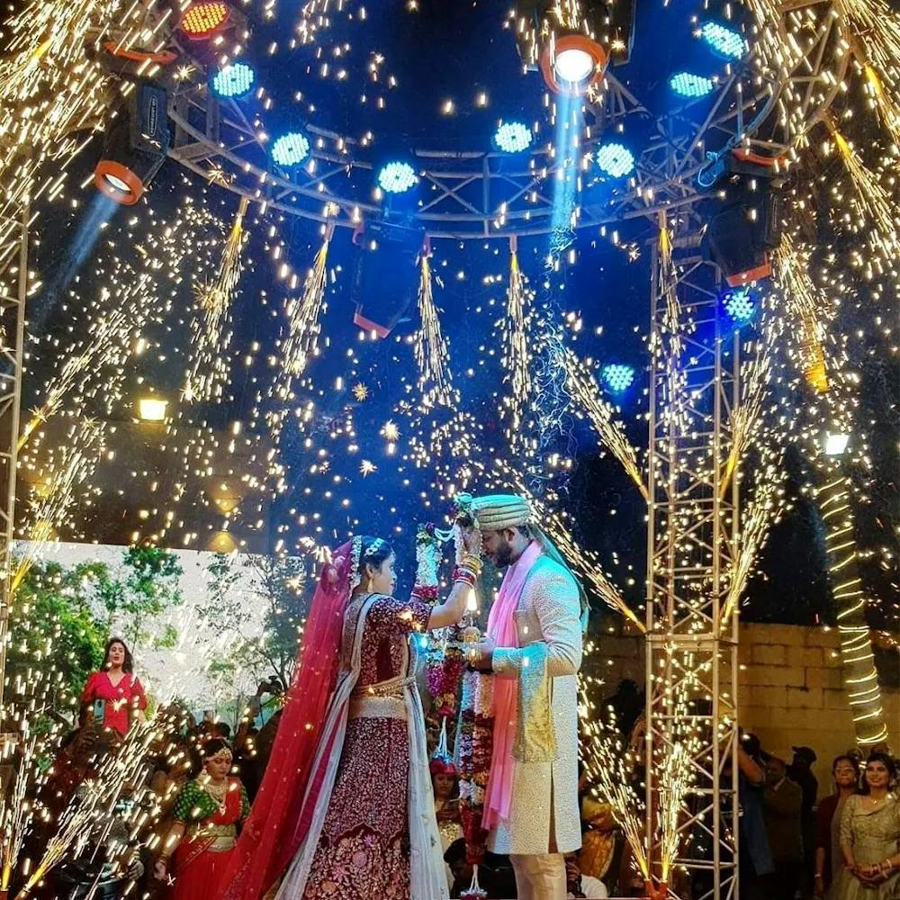 An affair of amazing lights in wedding stage decoration photo