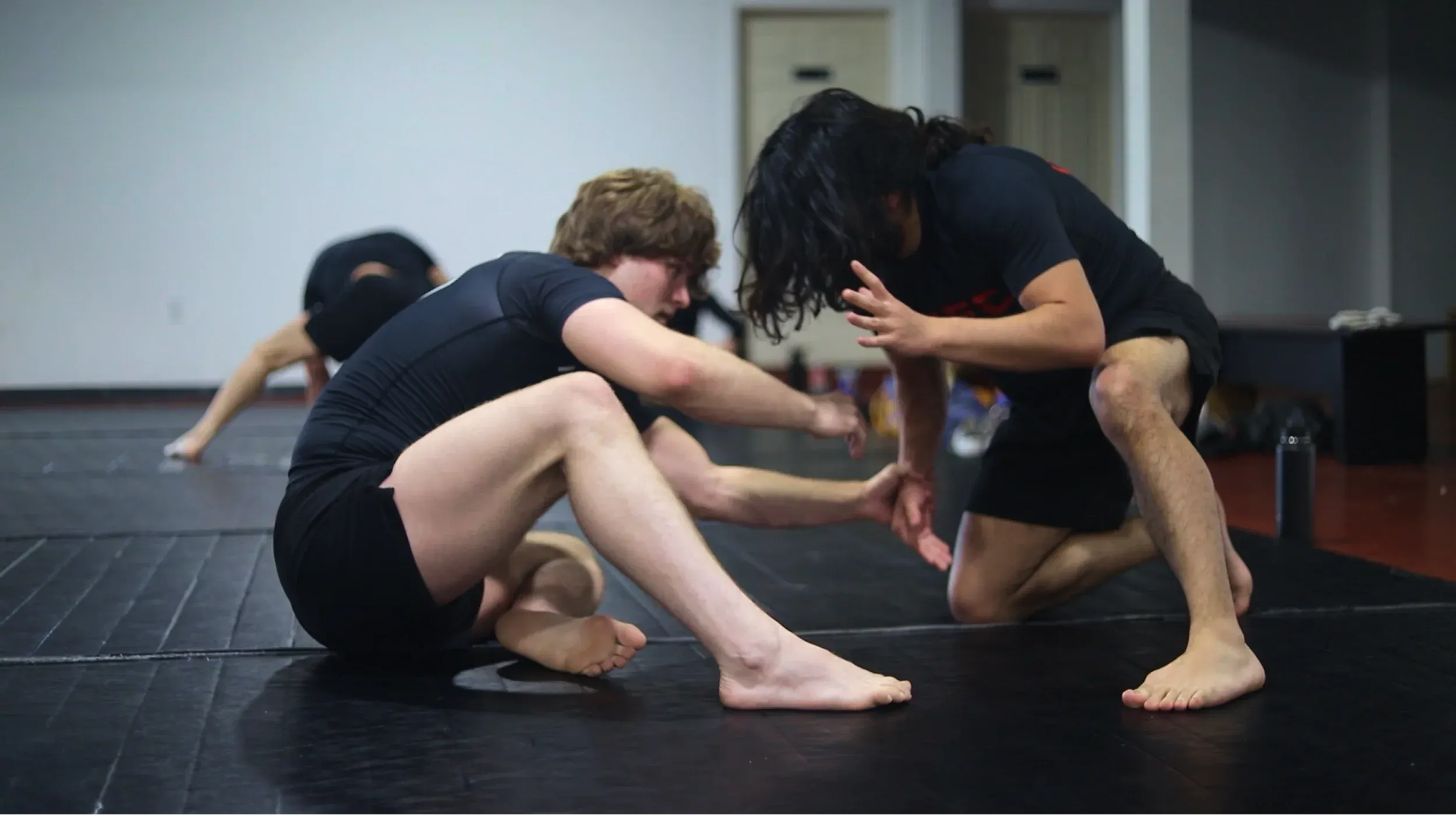 Porrada athlete on ground with opponent