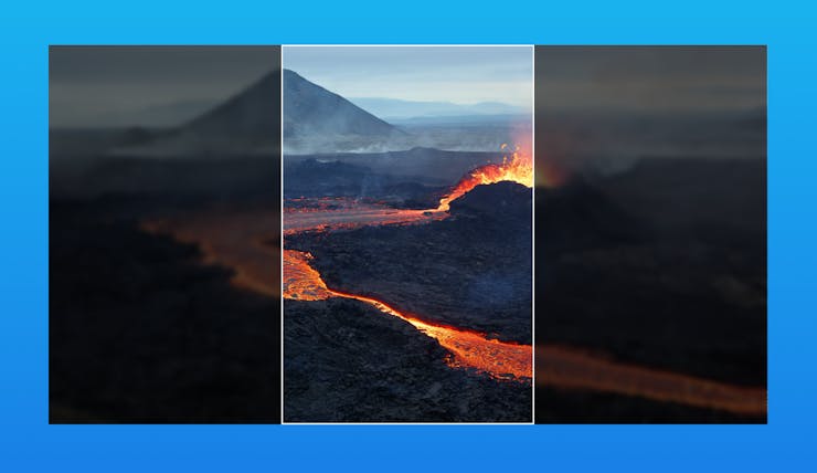 A picture of an off-centre volcano overlaid with an illustration of how cropping the centre of the frame cuts the volcano in half.