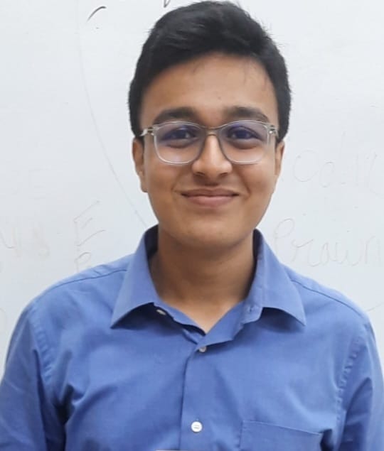 Vansh wearing his cool formal blue shirt