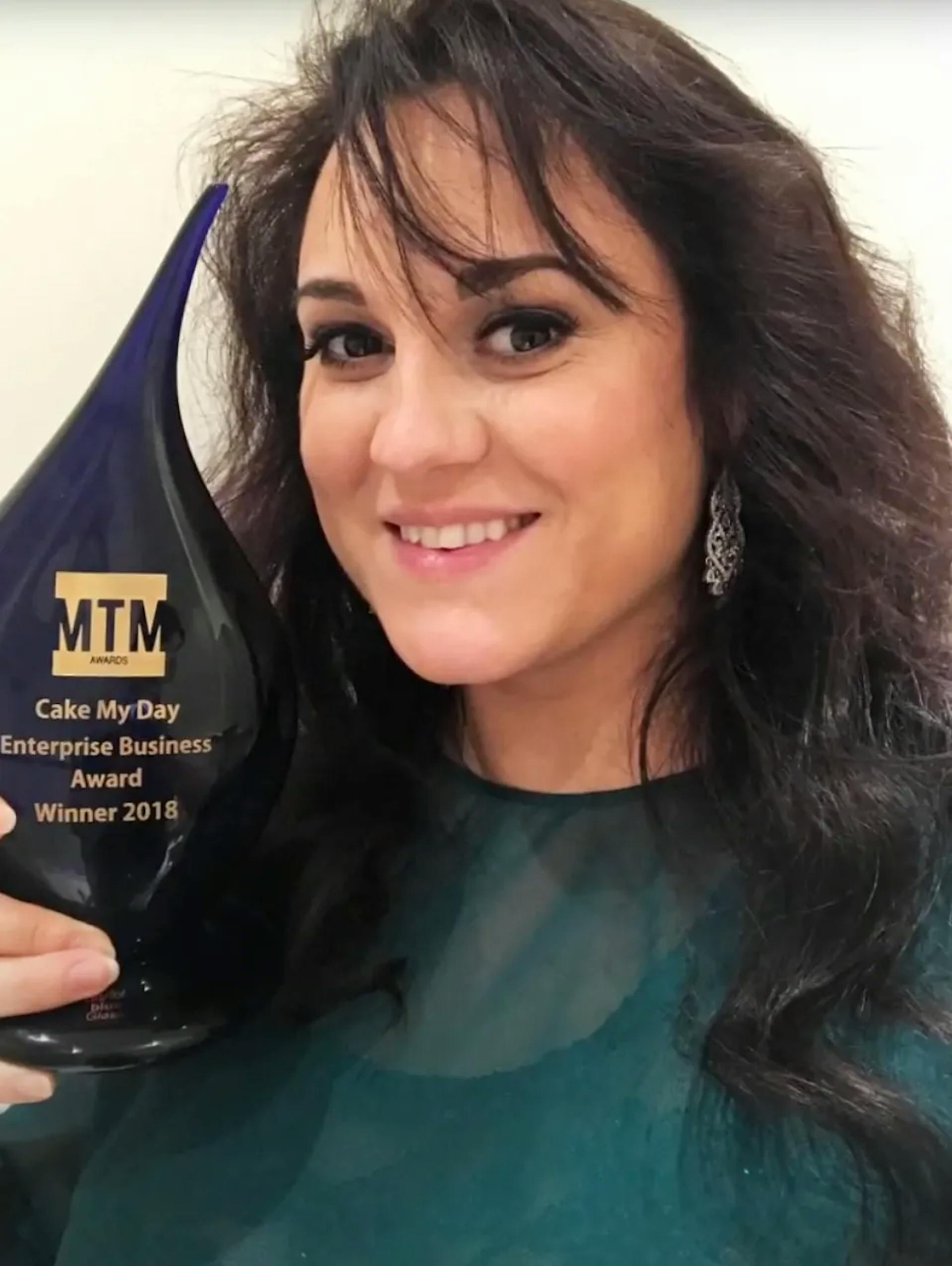 Georgiana Receiving Award at MTM Awards