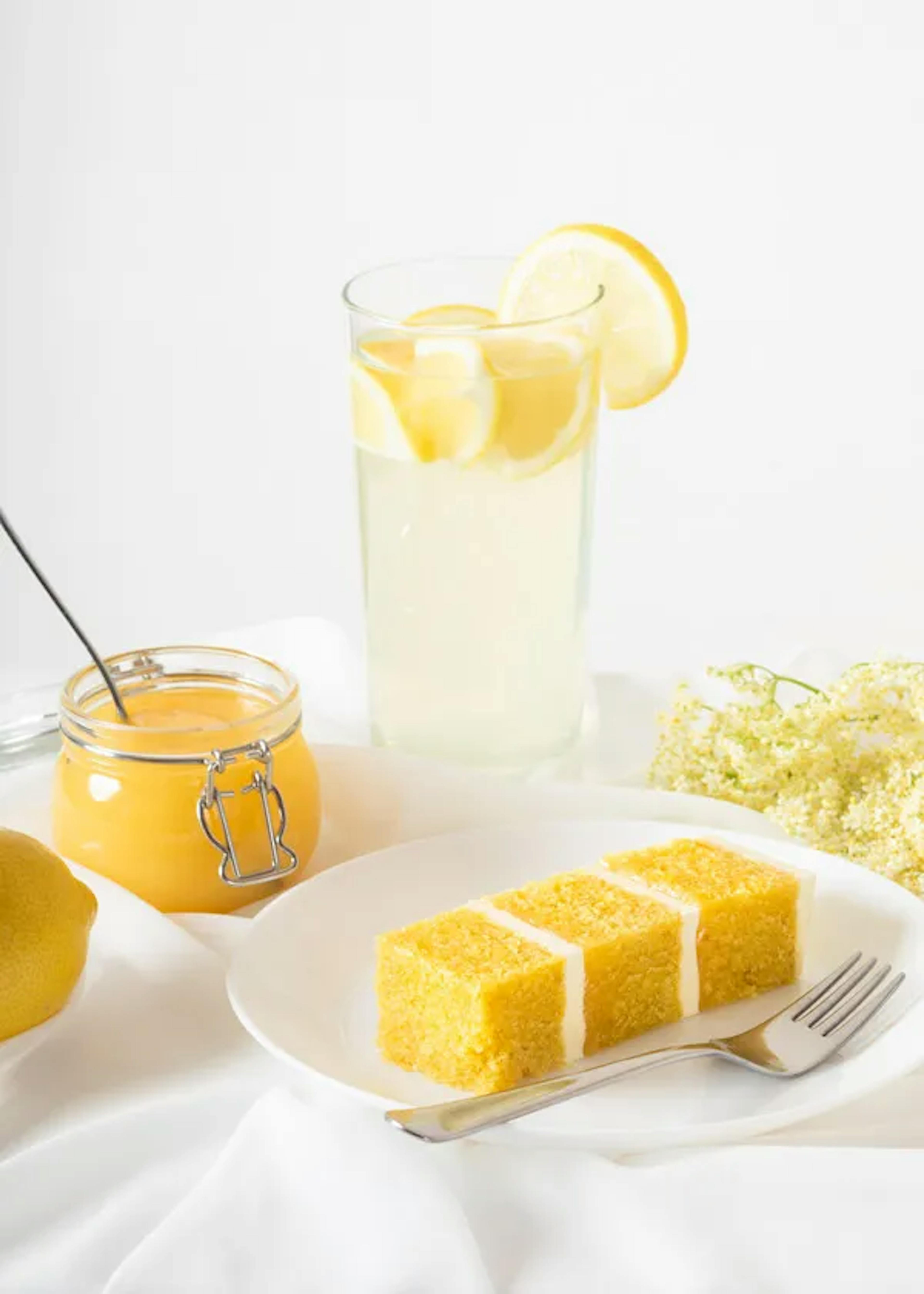 Tasking experience showing a lemon curd sponge cake