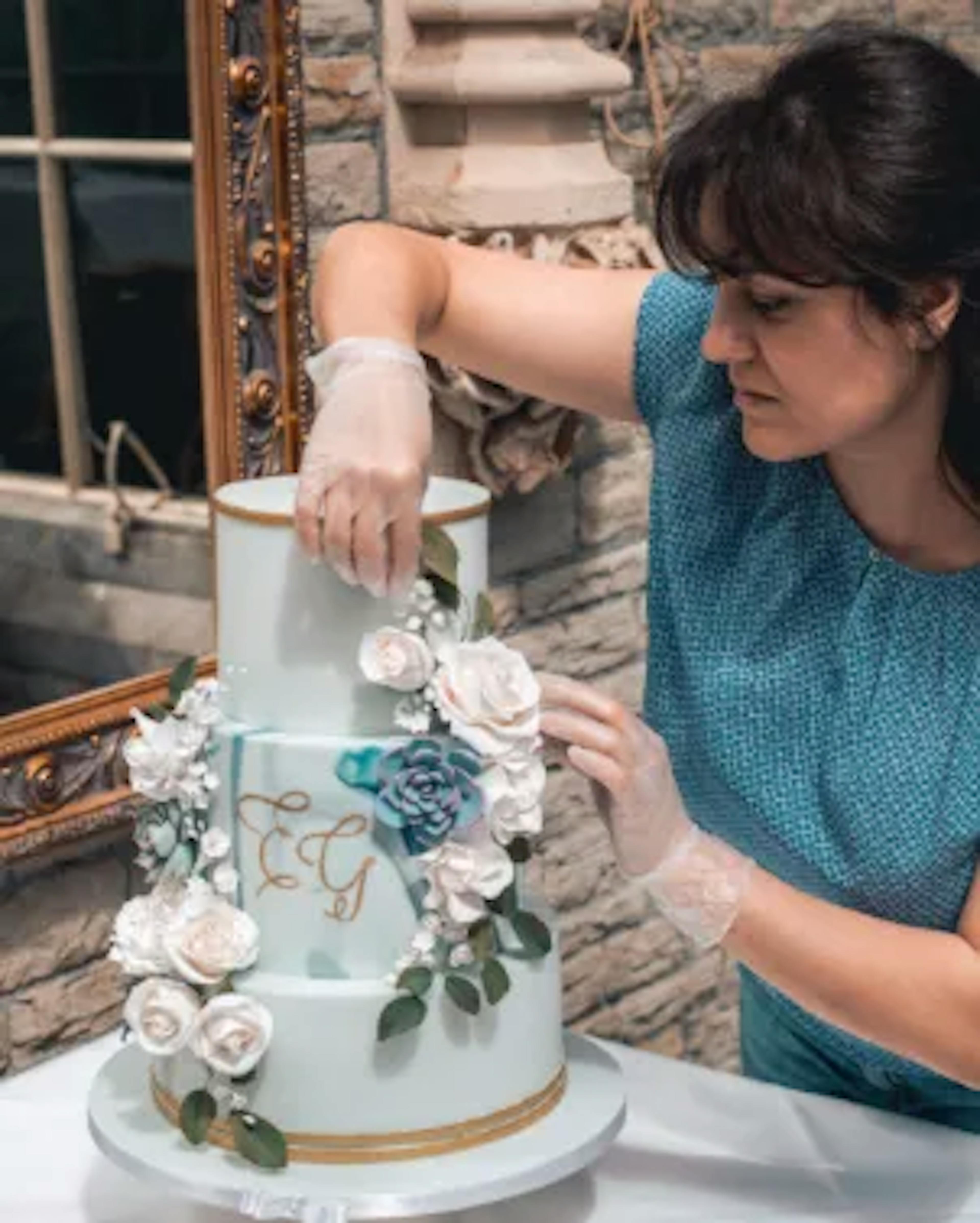 Georgiana doing a cake setup