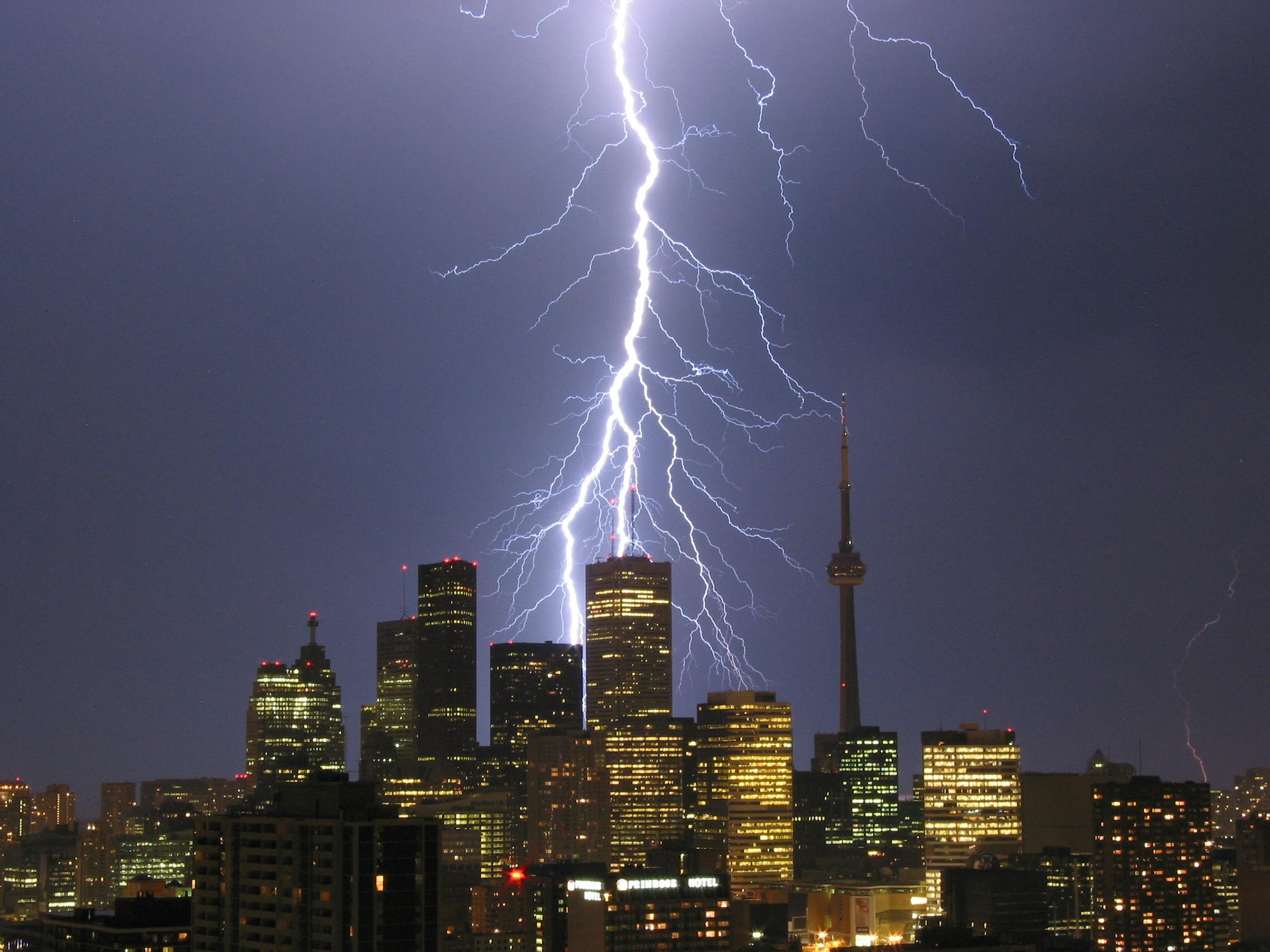 lightning during thunderstorm over city