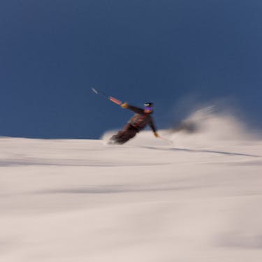 Skier skiing powder