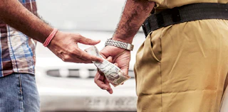 Andhra: Transport officials caught red-handed by ACB