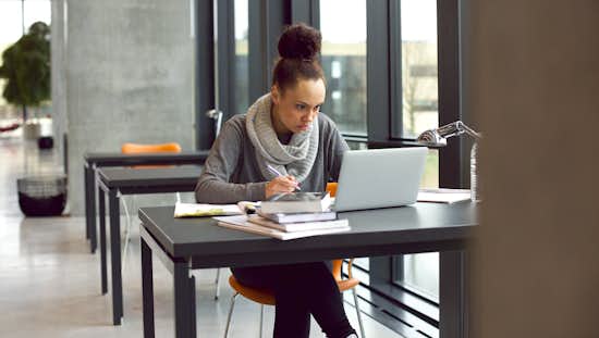 High School student taking online medical course High School student taking online medical course