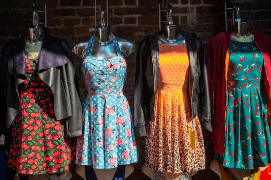 Mannequins wearing various fashion dresses and jackets Mannequins wearing various fashion dresses and jackets