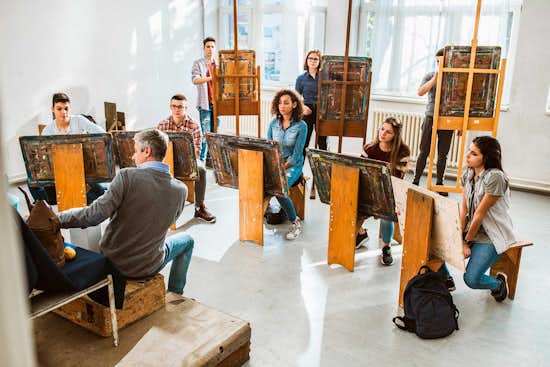 High School students taking art course High School students taking art course