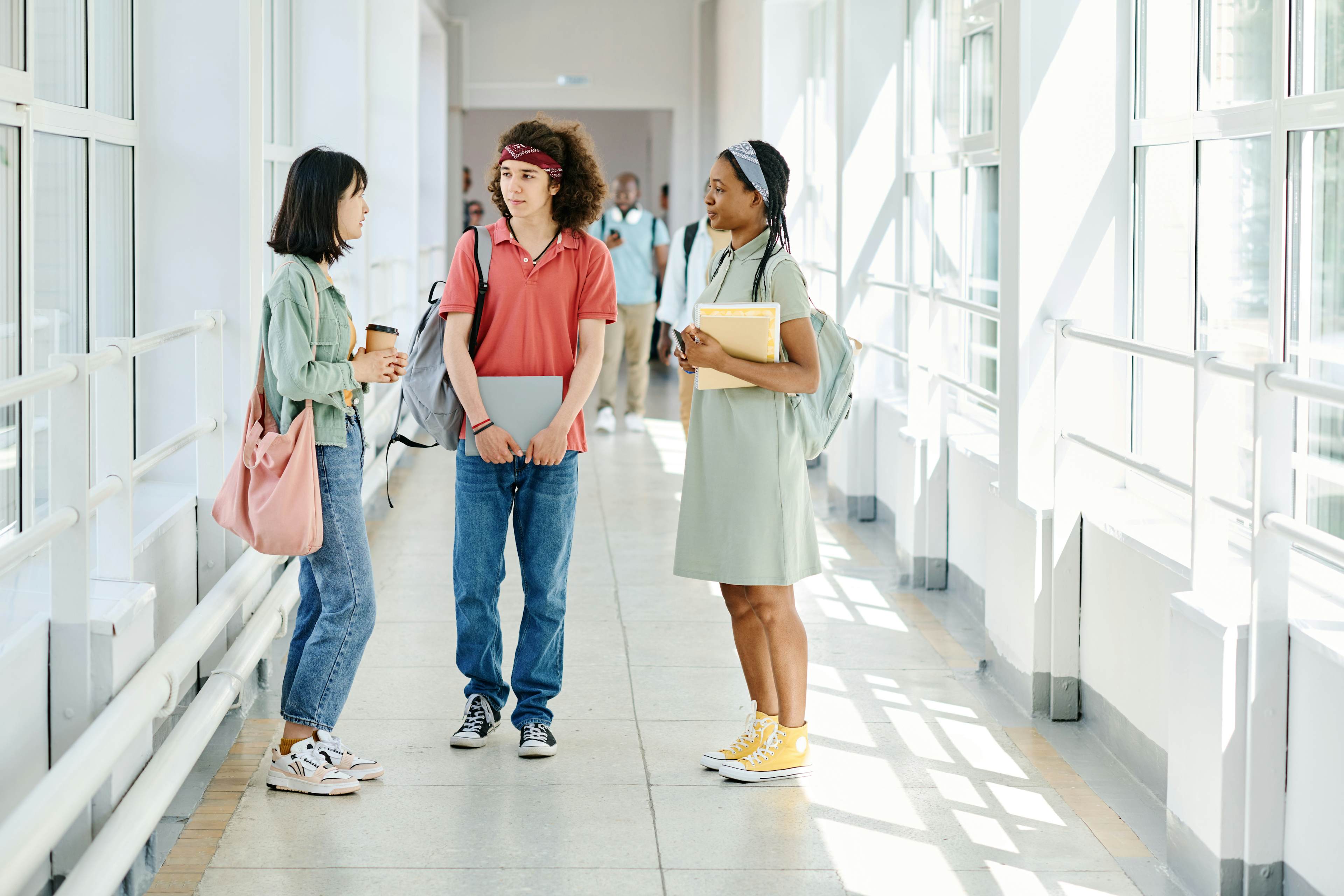 High school students in the hallway of a university campus