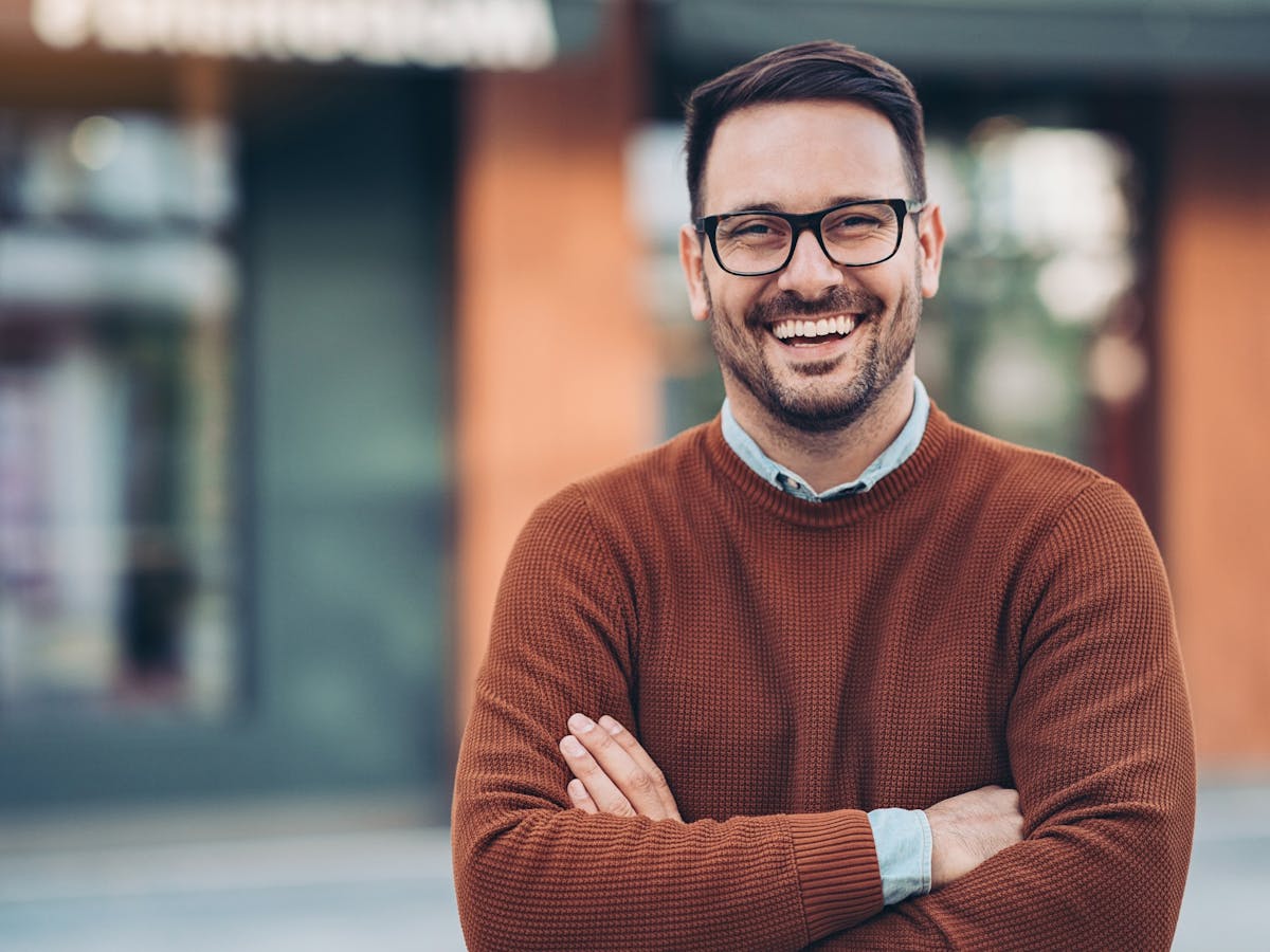 smiling man outside