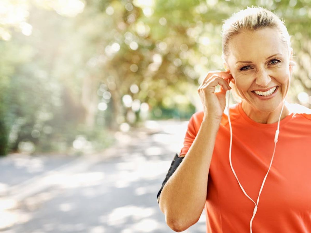 healthy older woman outside working out