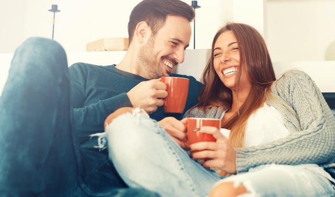Happy couple at home.