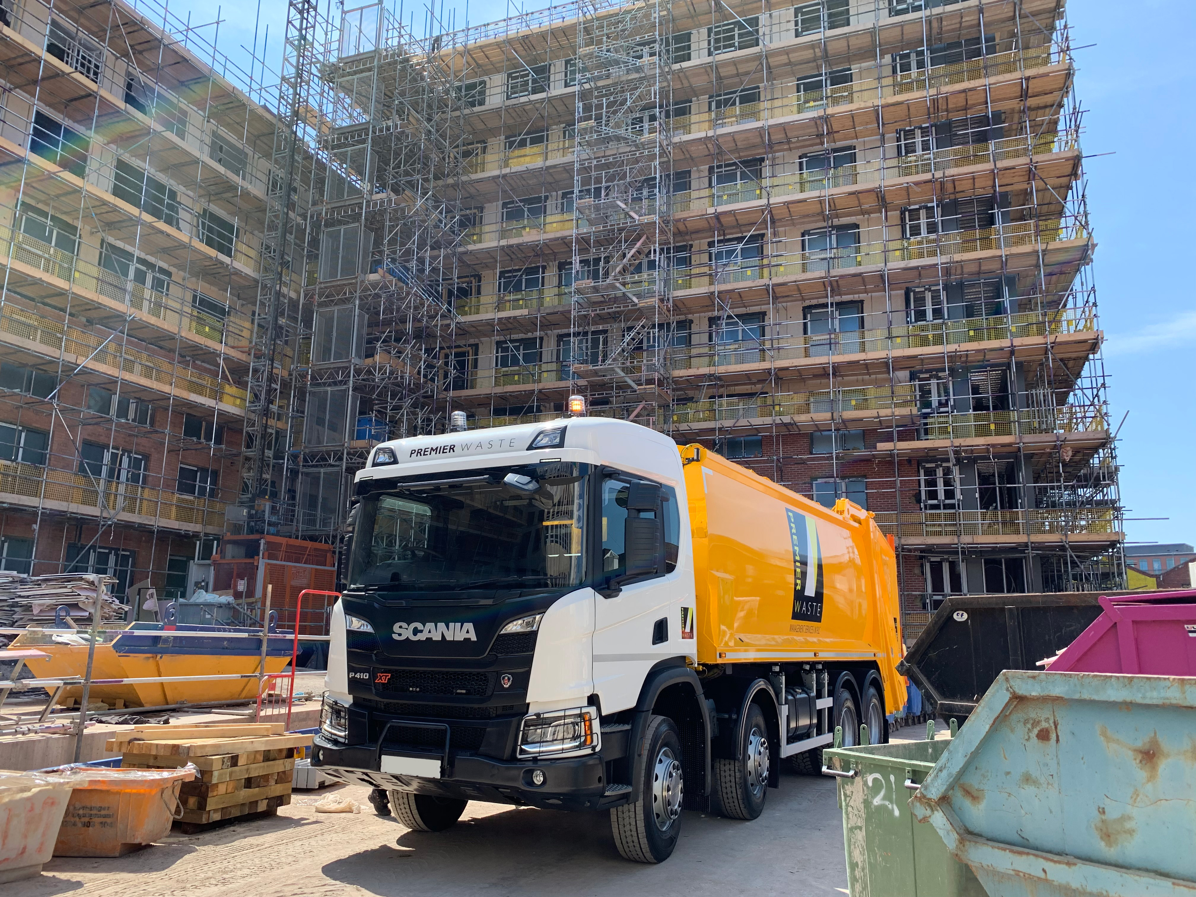 Orange premier waste truck