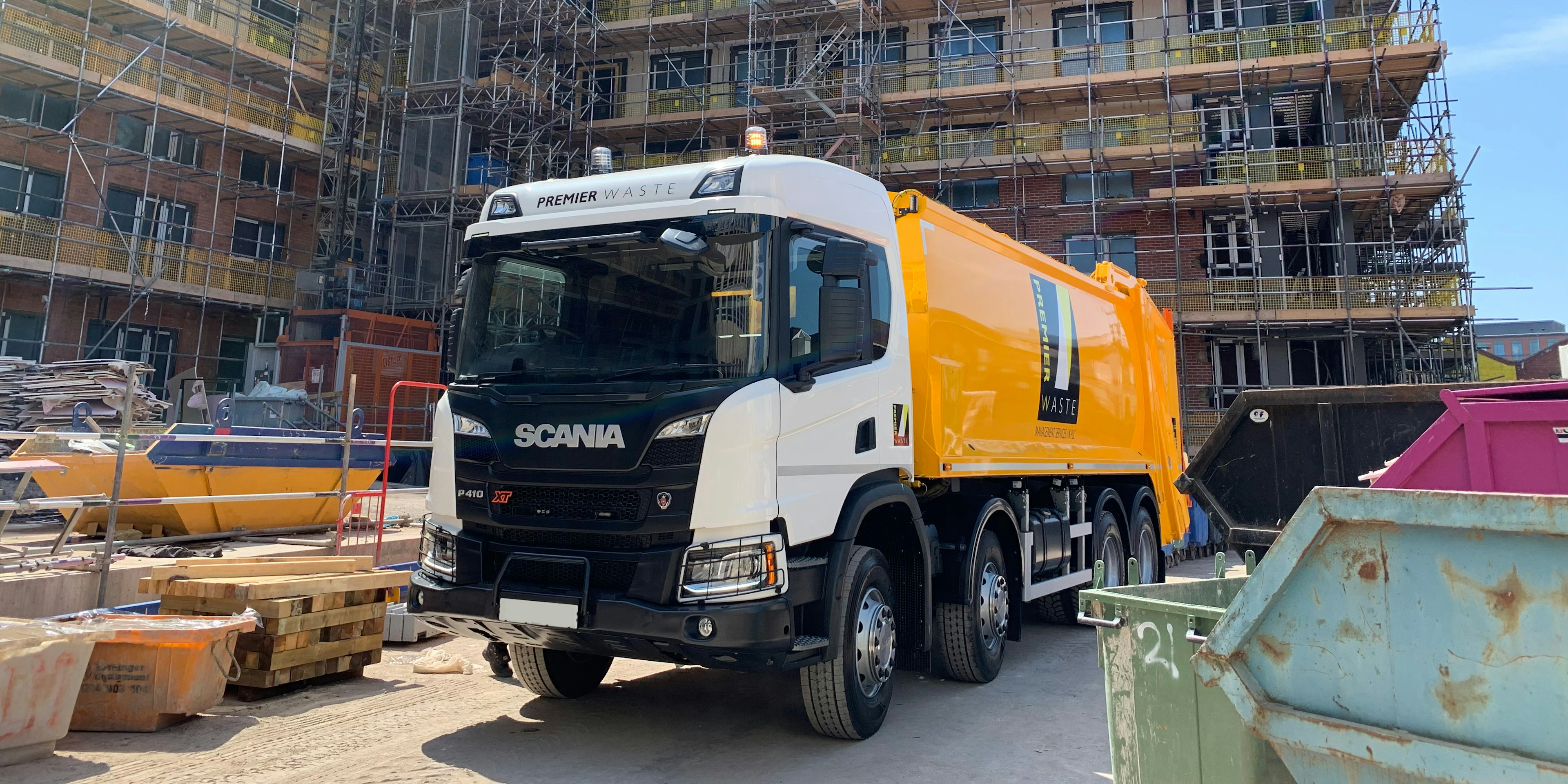 Orange premier waste truck