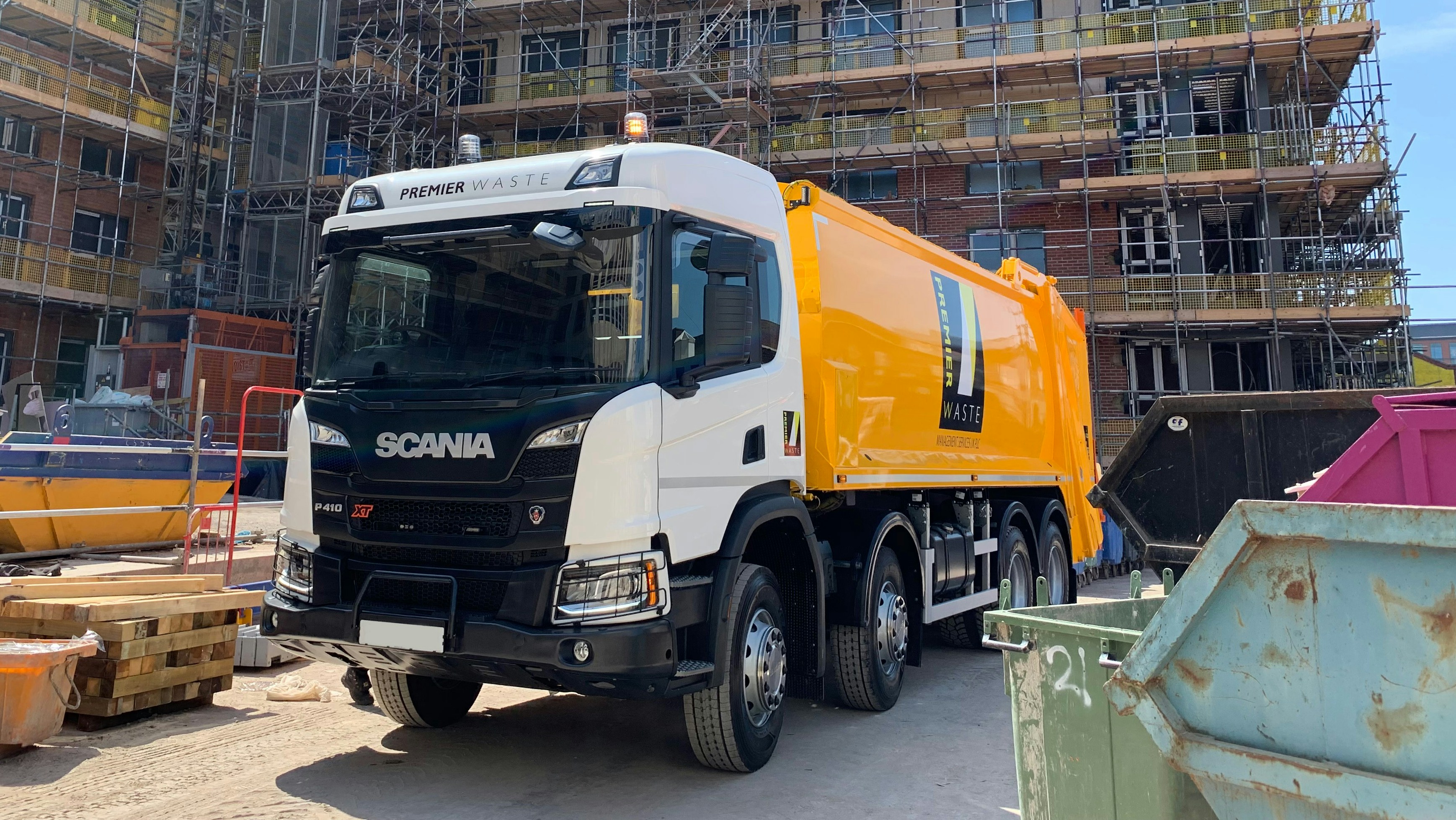 Orange premier waste truck