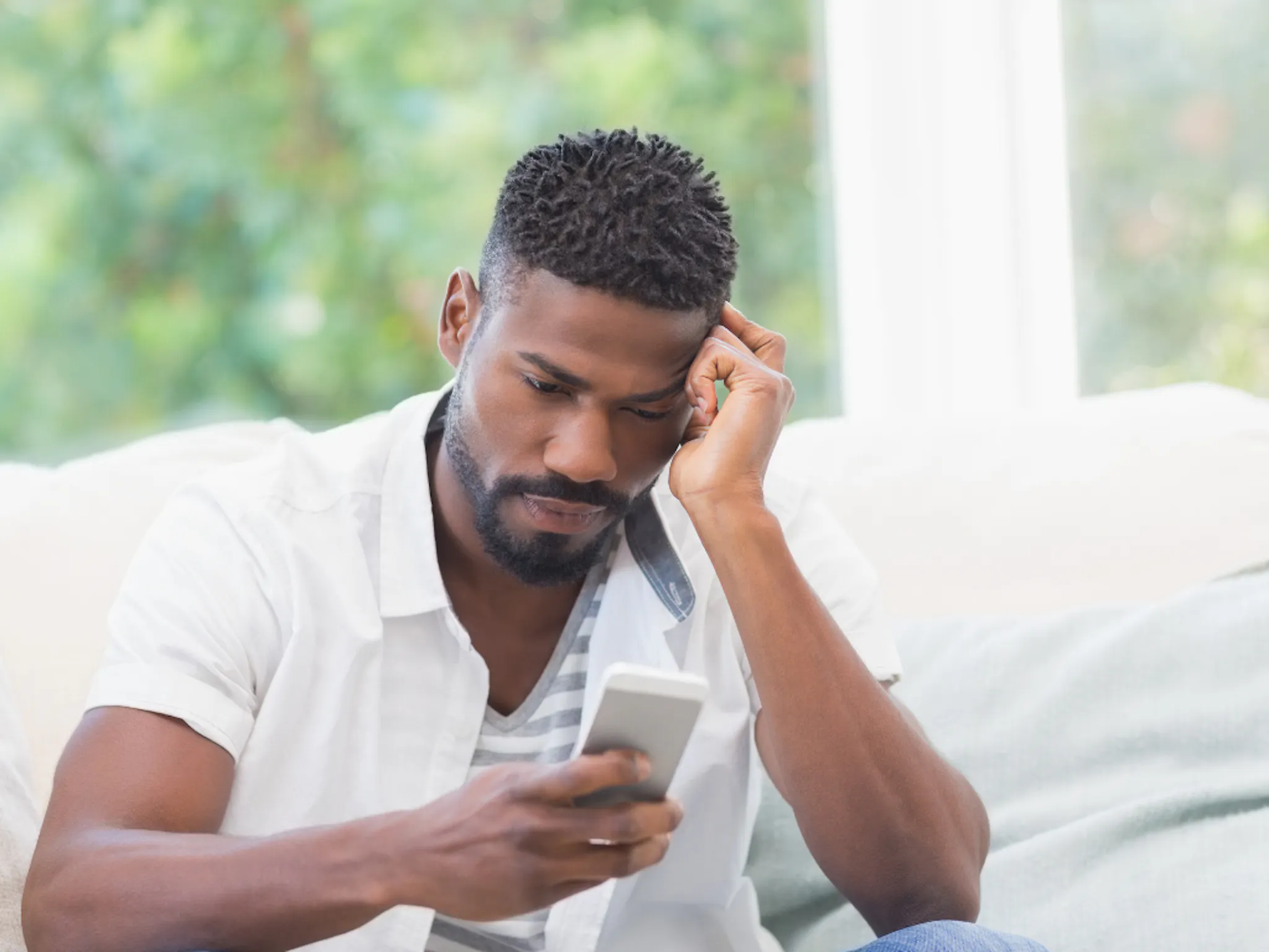 Image showing a person looking at there mobile device