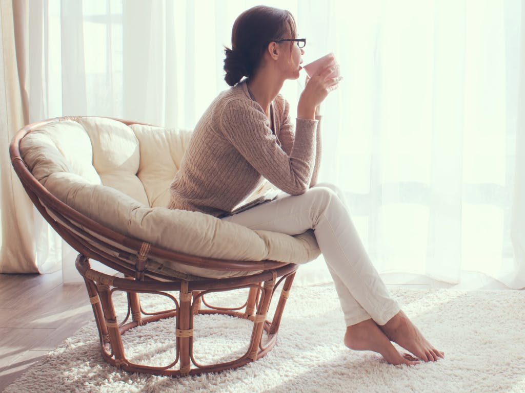 Image showing a person looking out of a window