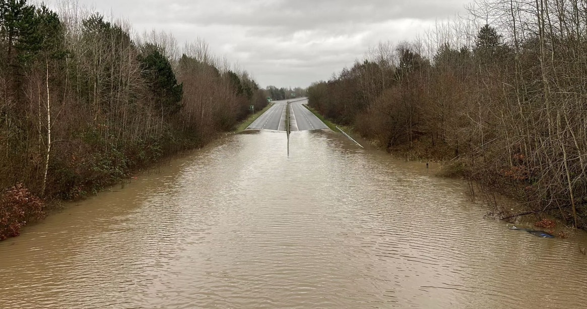 A555 relief road in Stockport flooded