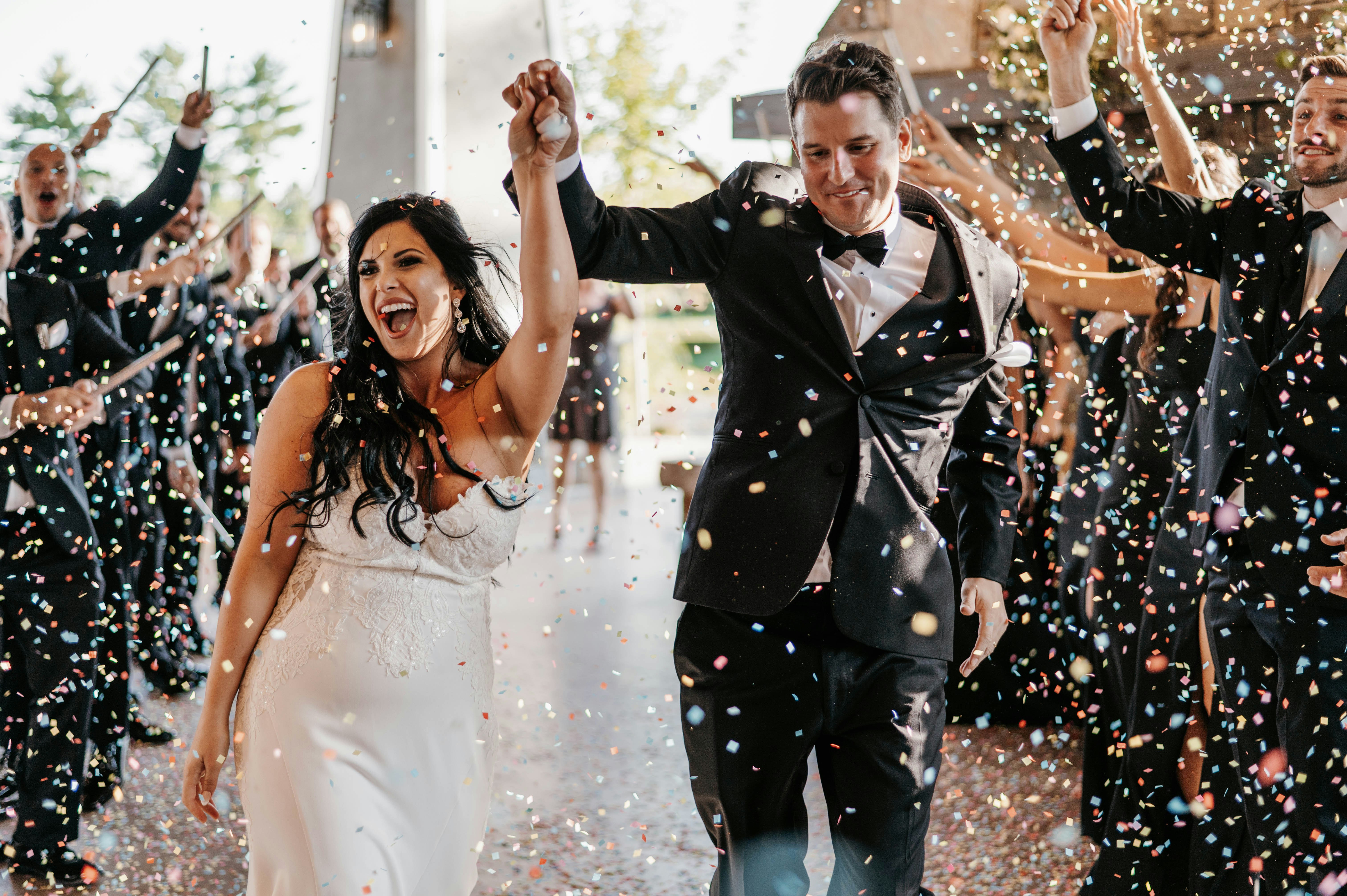 Bride and Groom walking down the isle