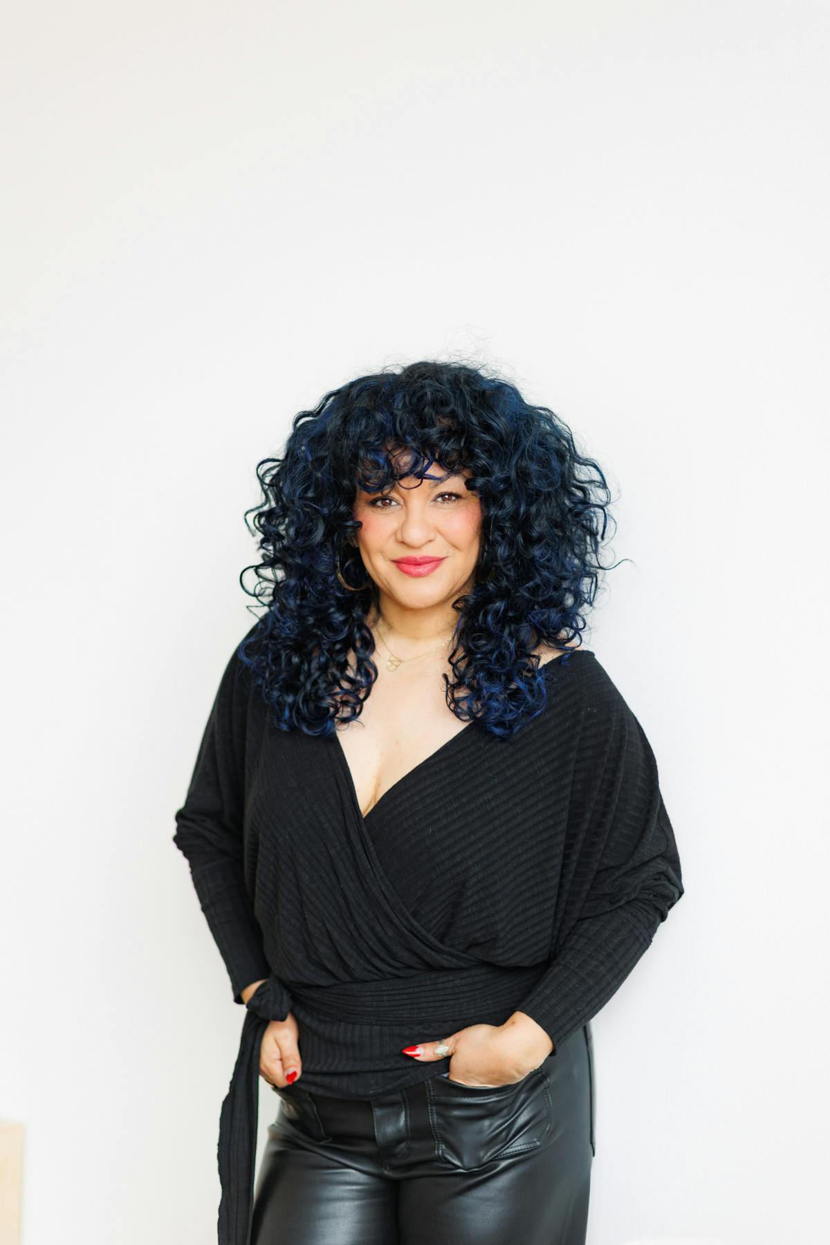 woman with black hair and black clothes at Abide studio