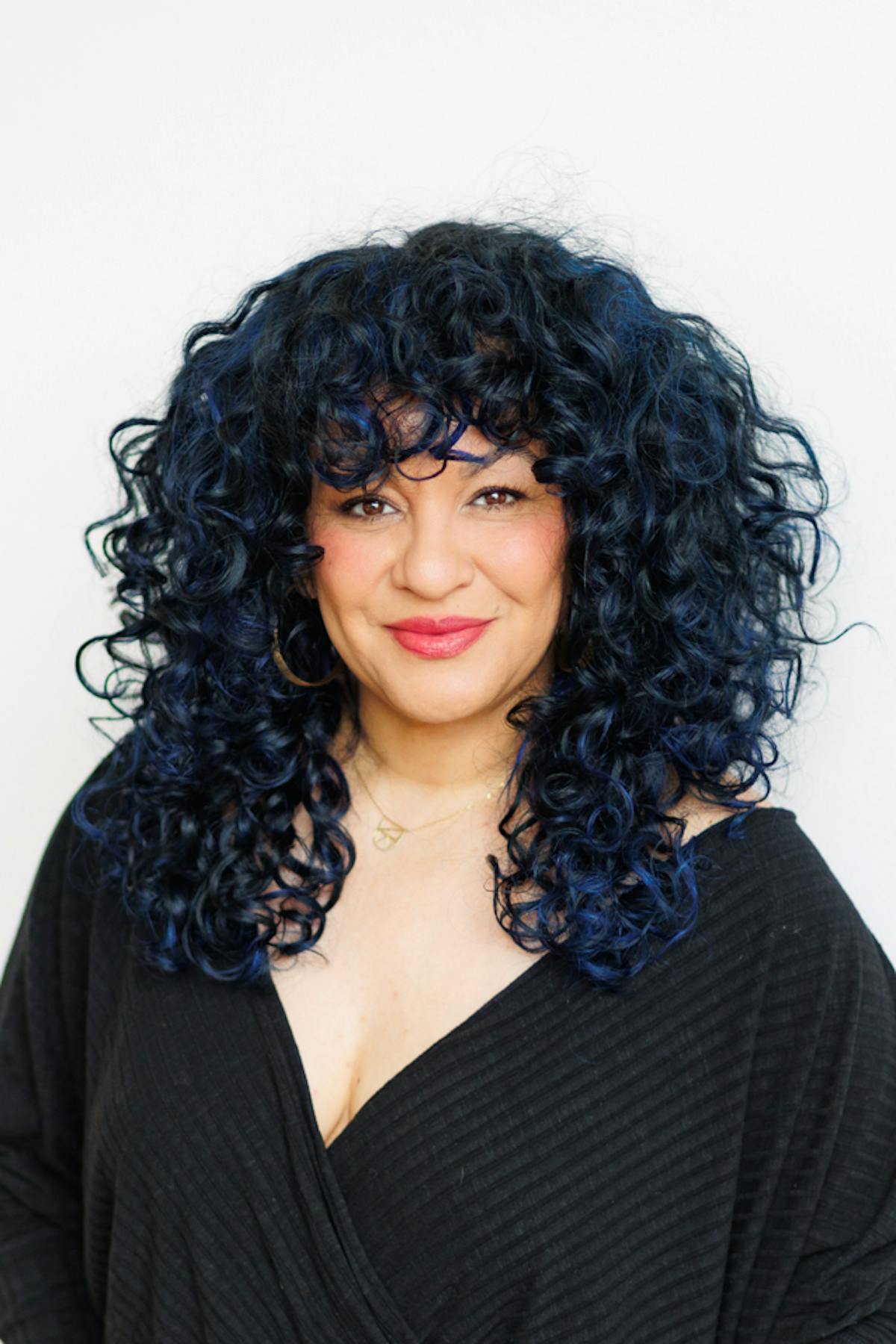 woman with red lips smiling