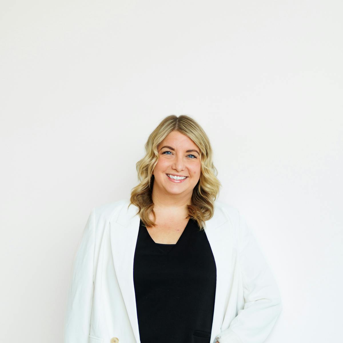 smiling woman at abide studio for photoshoot