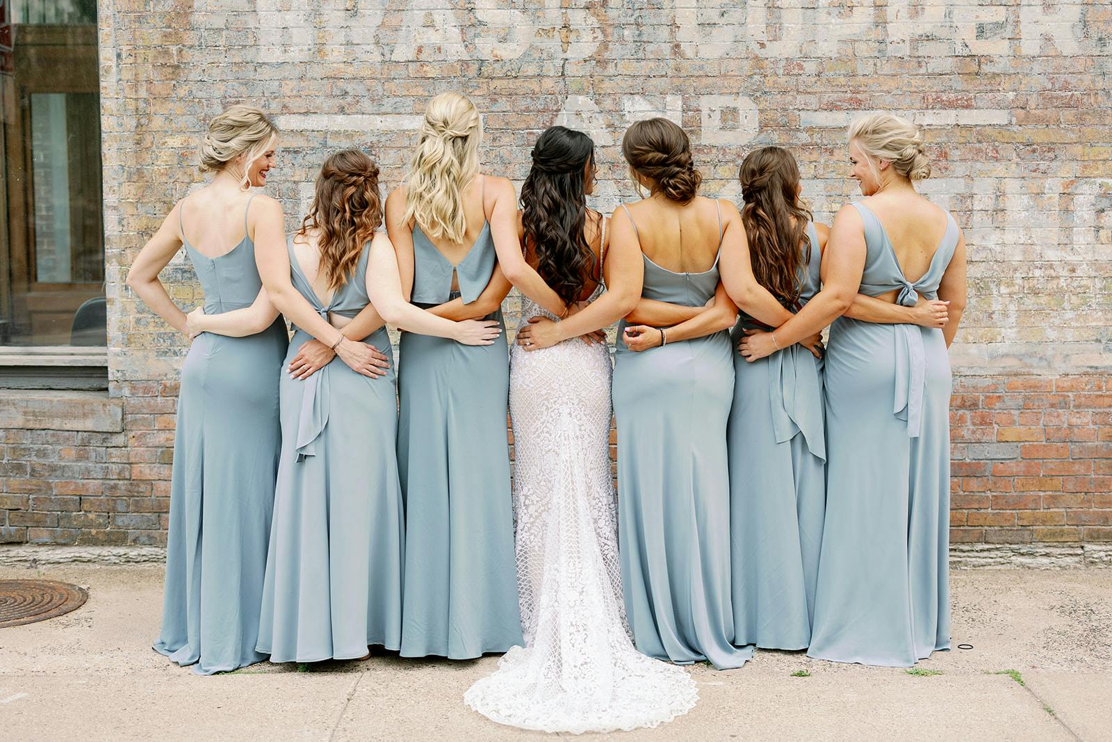 Bridal party showcasing long beautiful waves and half up styles