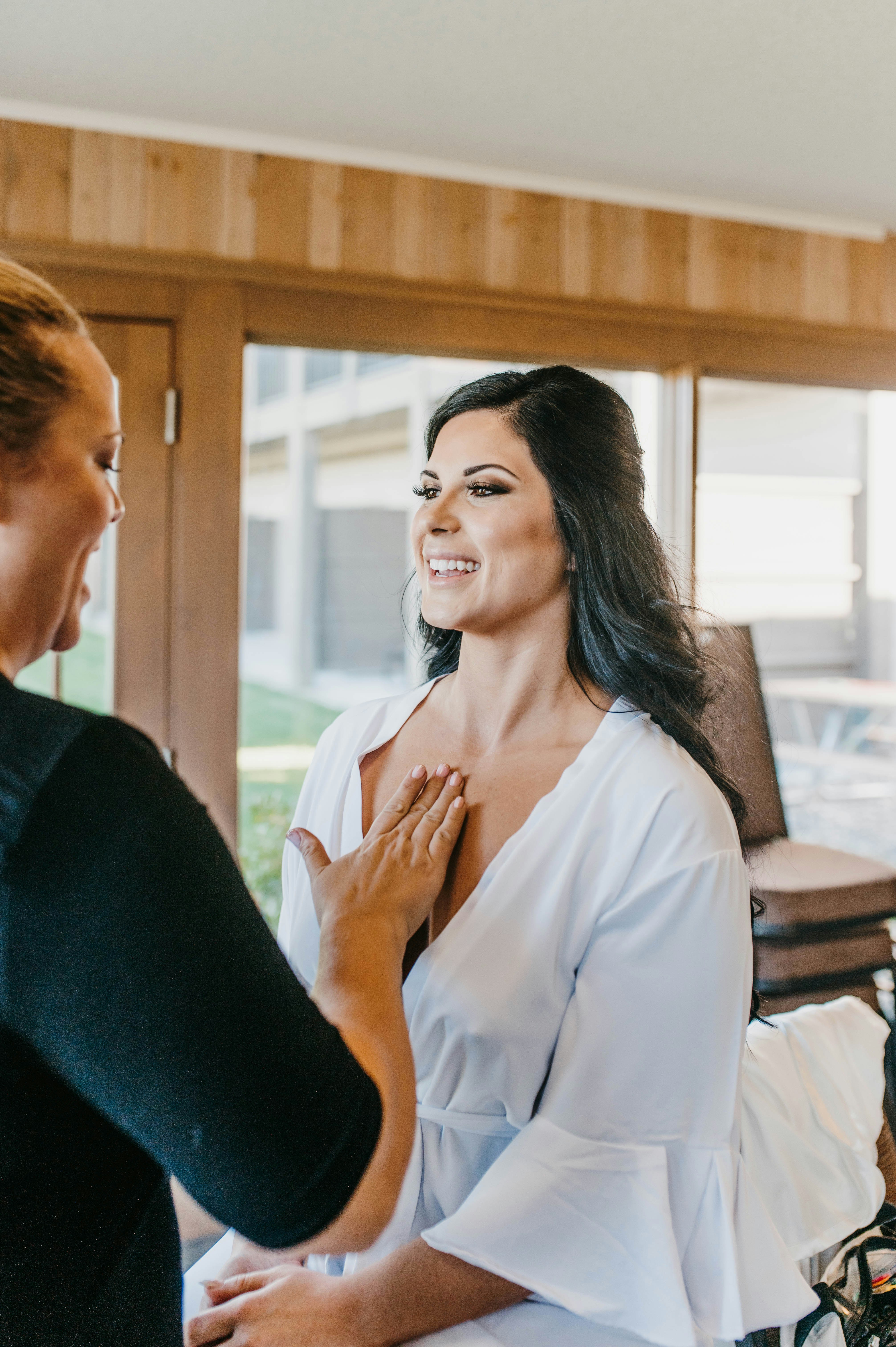 bride having full glam makeup applied