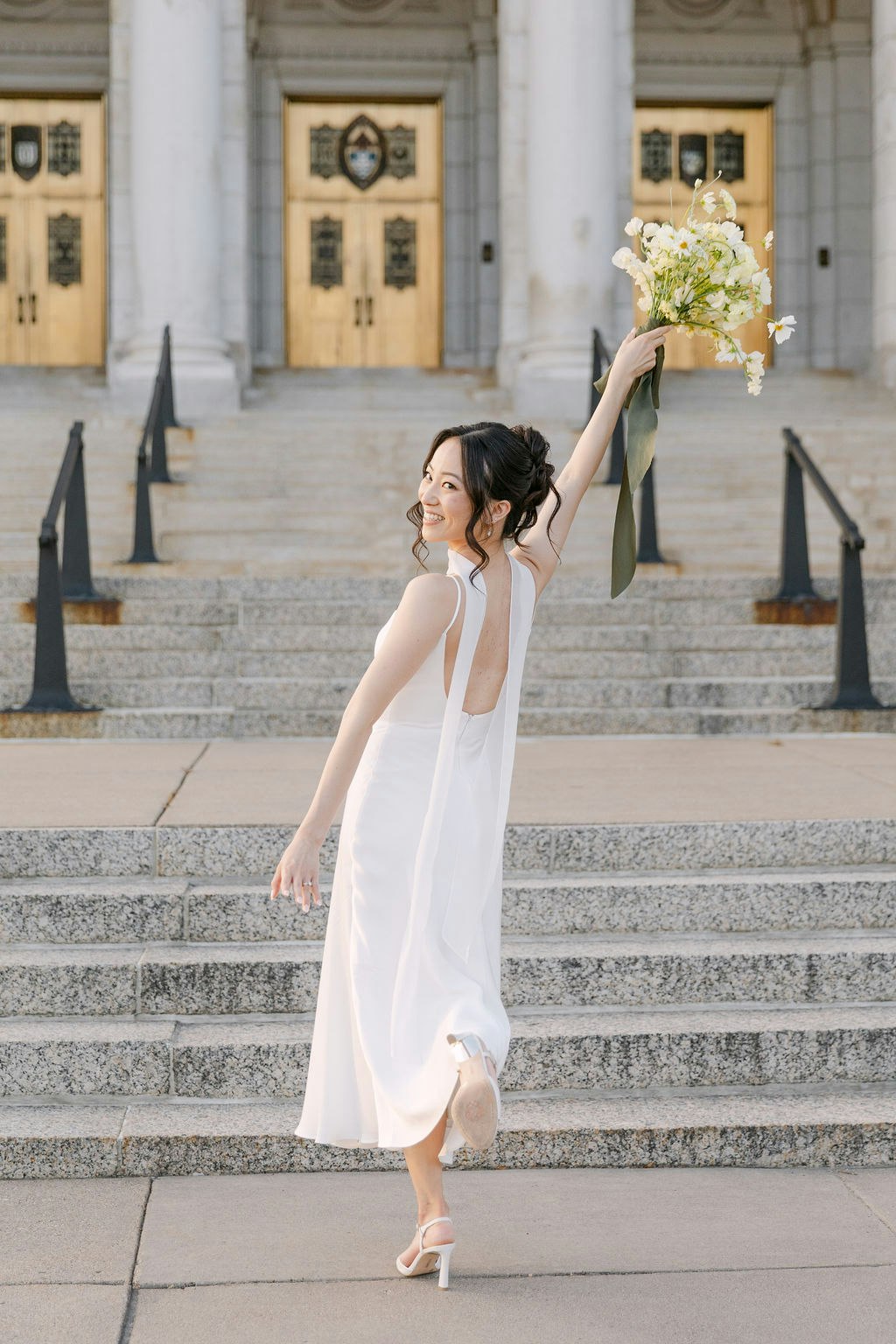 Bride celebrating after her Minneapolis ceremony