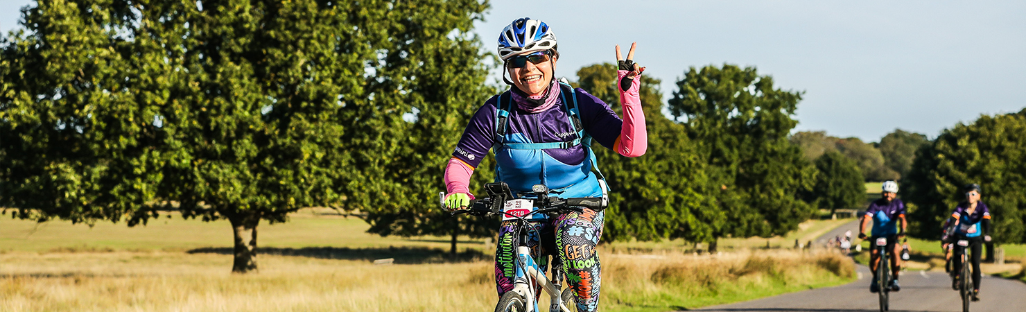 A cyclist in Richmond park for Palace to Palace 2022
