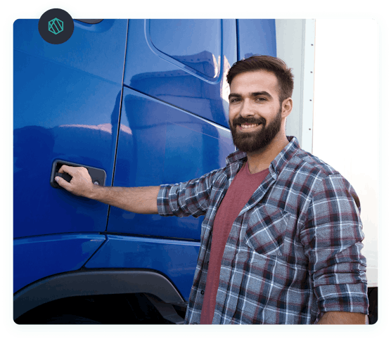 chauffeur routier devant son camion