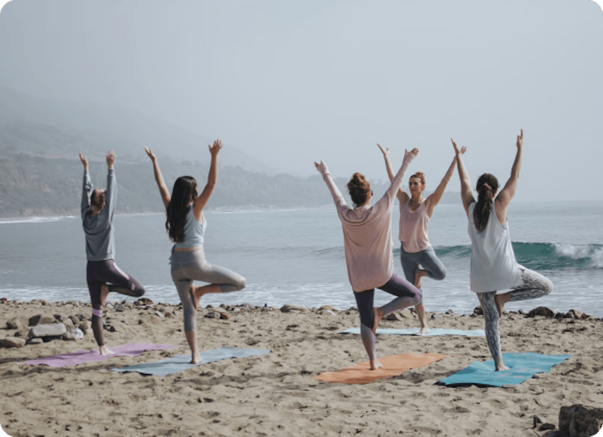 Yoga pose in the beach