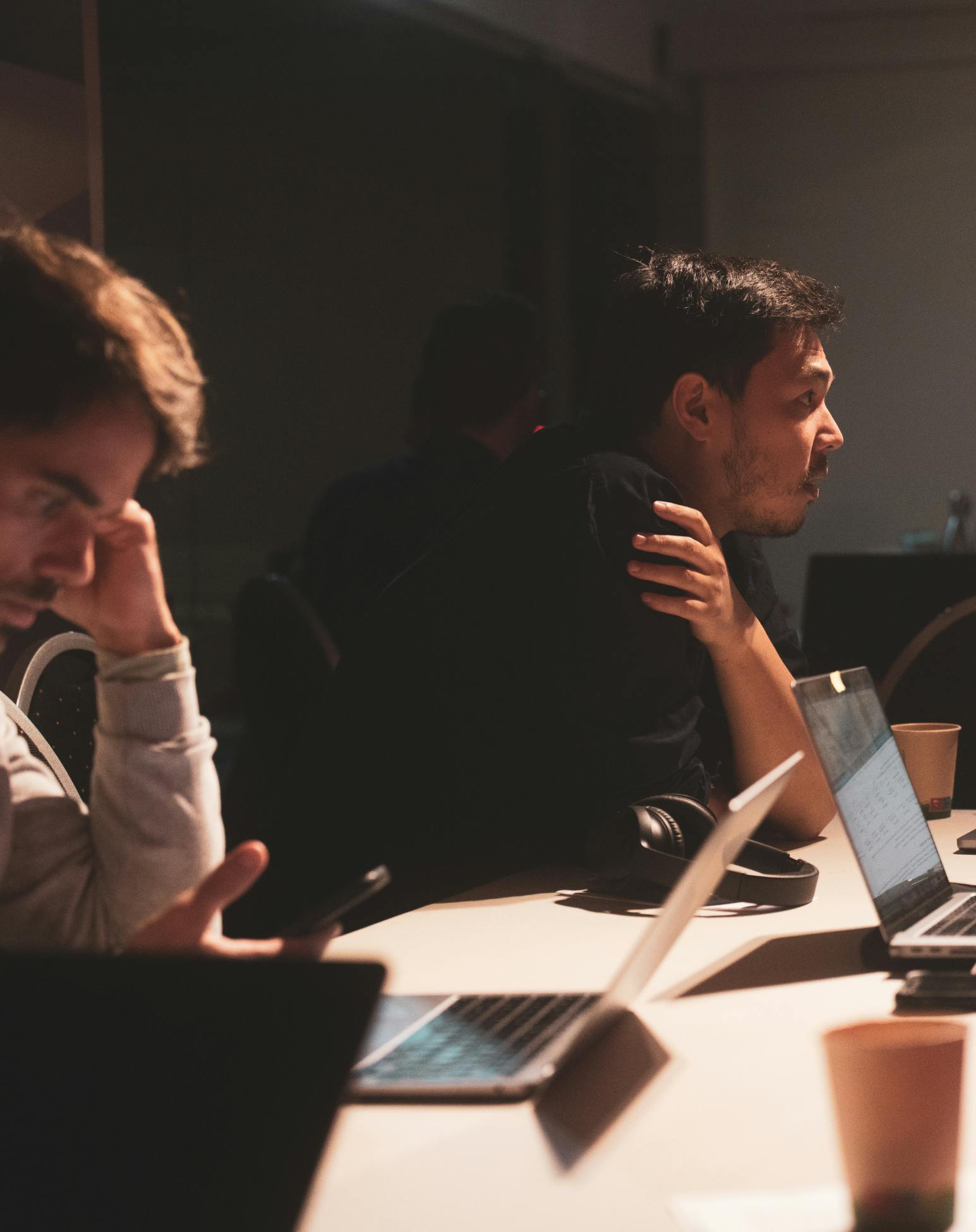 Picture of two team members in a coworking space