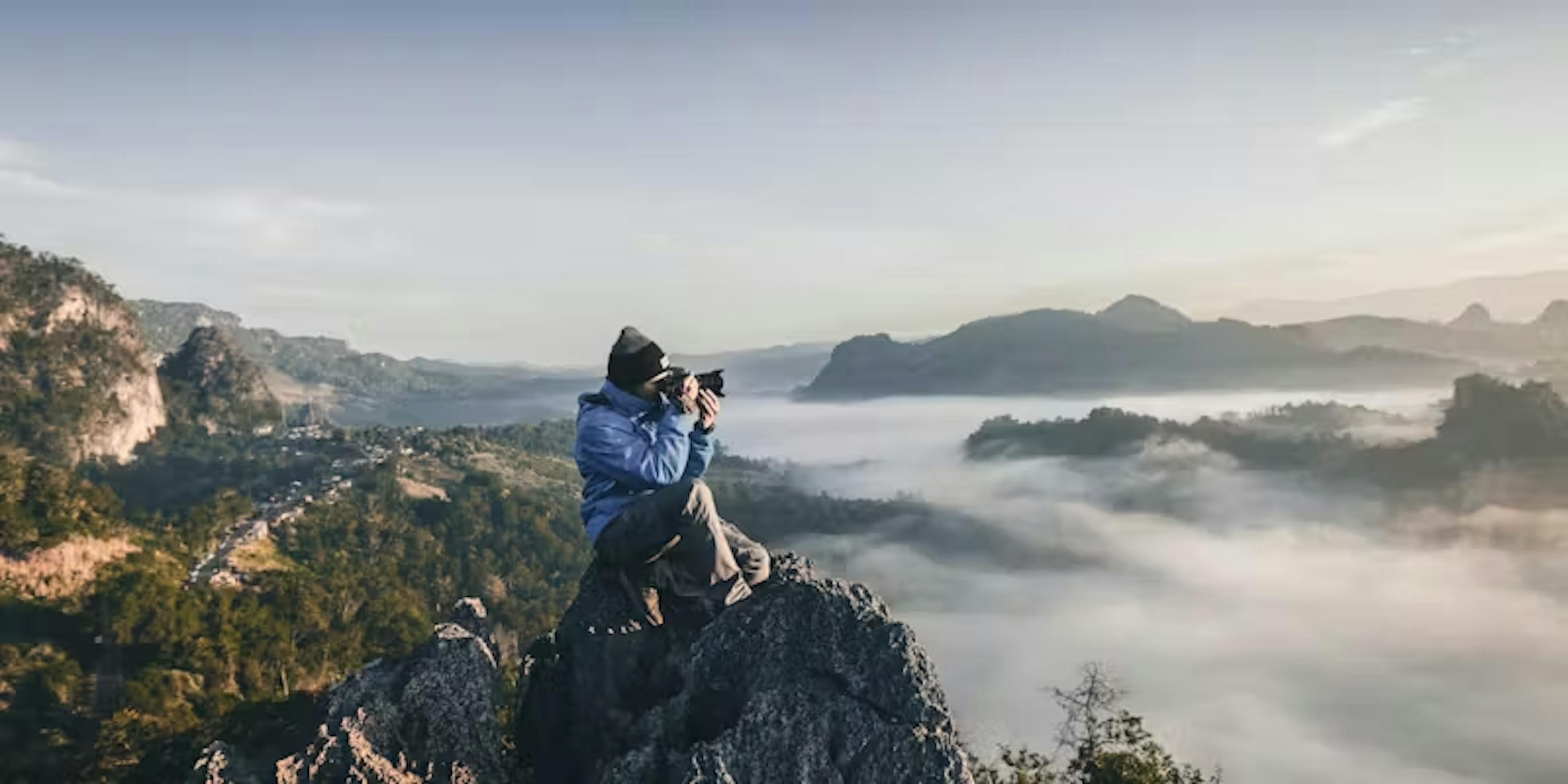 Photographer on mountain