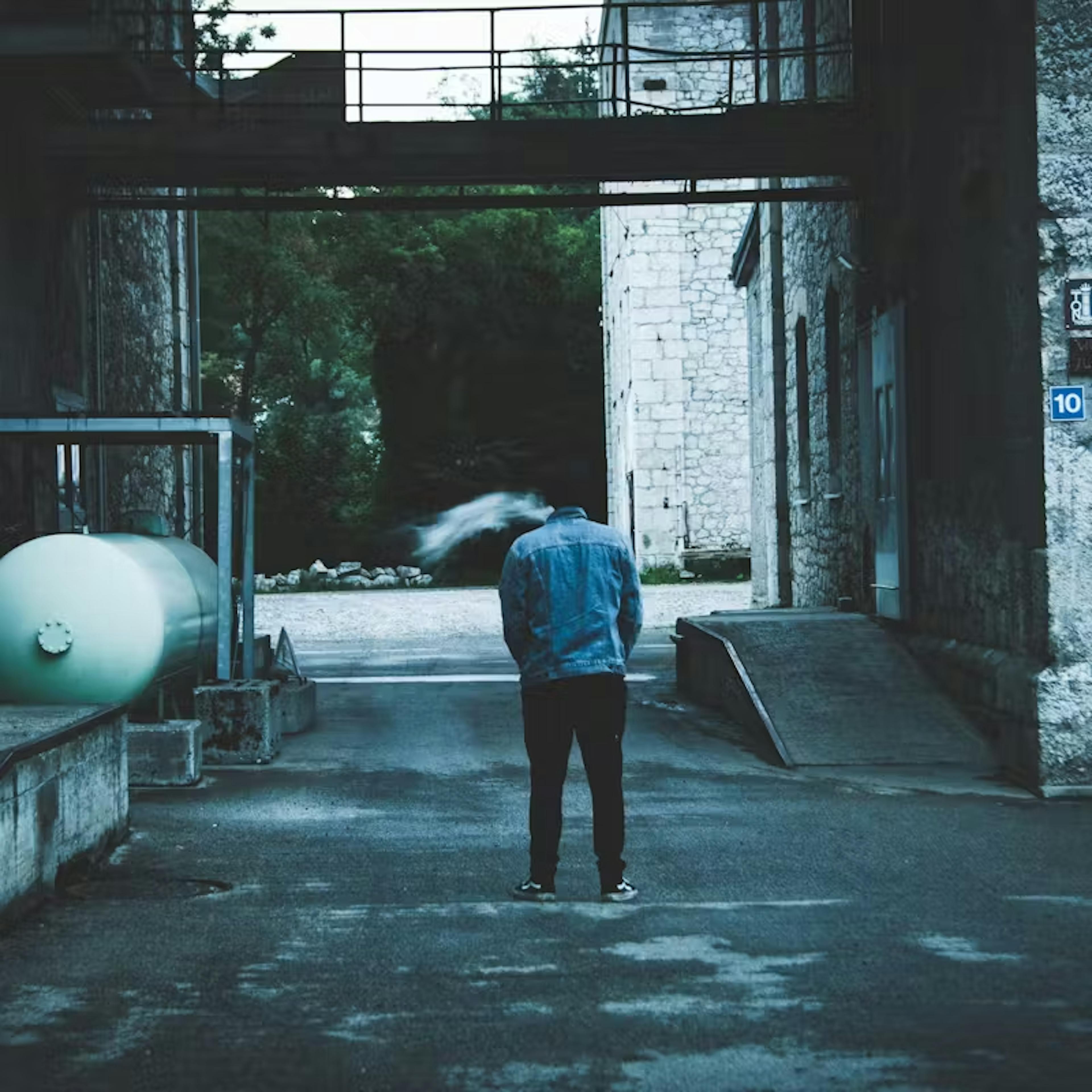 Person standing on empty street