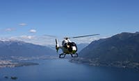 helecopter flying between islands