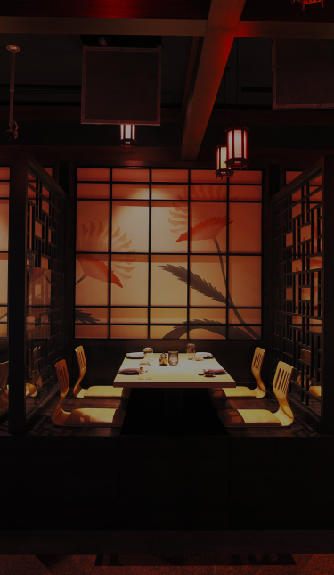 KŌYŌ Dubai, UAE - Intimate restaurant with low lighting, featuring neatly arranged tables and chairs creating a cozy ambiance. 
