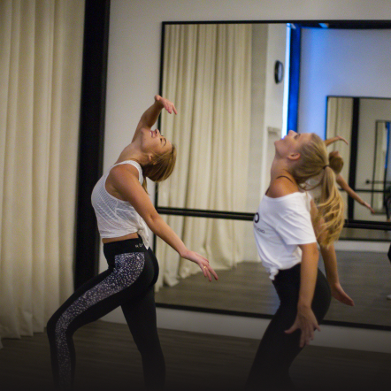 Two females doing a Dance class in a Dubai gym