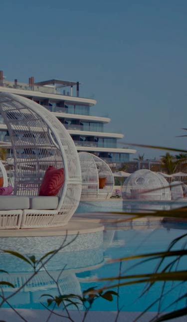 cabanas by the pool in the w dubai the palm