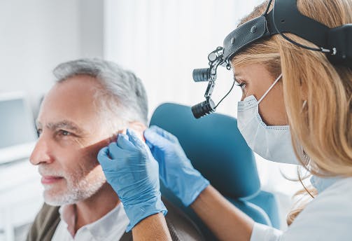 mature patient with hearing problem visiting proear clinic