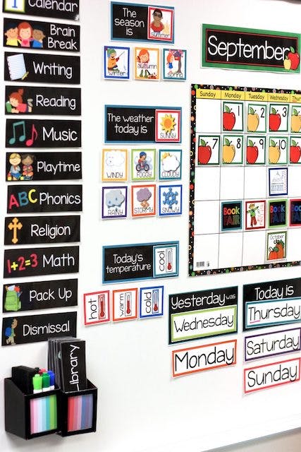 Whiteboard with labeled magnets to track schedule.