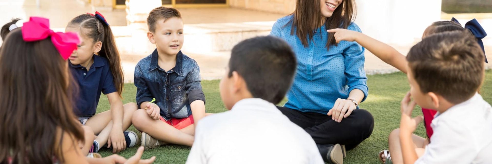 Children sit in a restorative circle during restorative justice activities.
