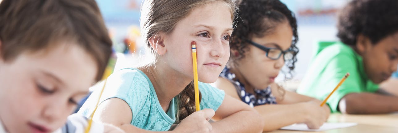 problem solving and mental arithmetic Child sitting at her desk, using mental math practices to help her complete her work.