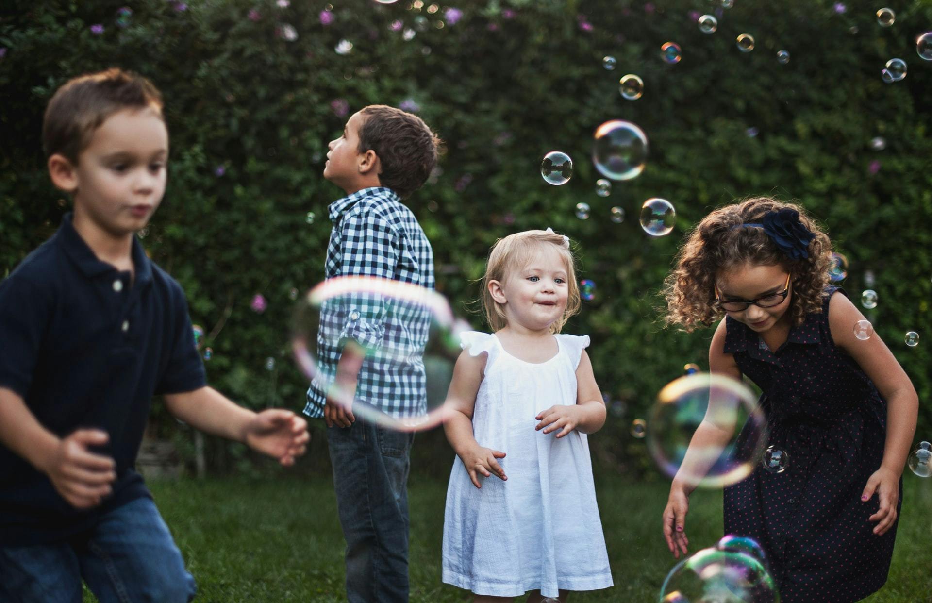 Kids play outside during a playdate activity.