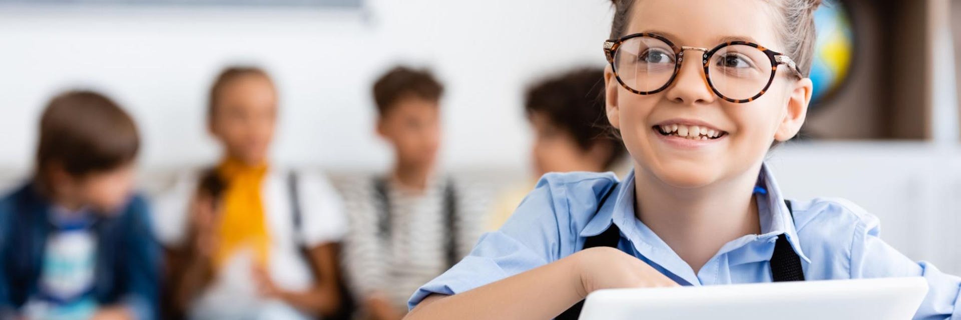 Young female student practices for a standardized test on a tablet.