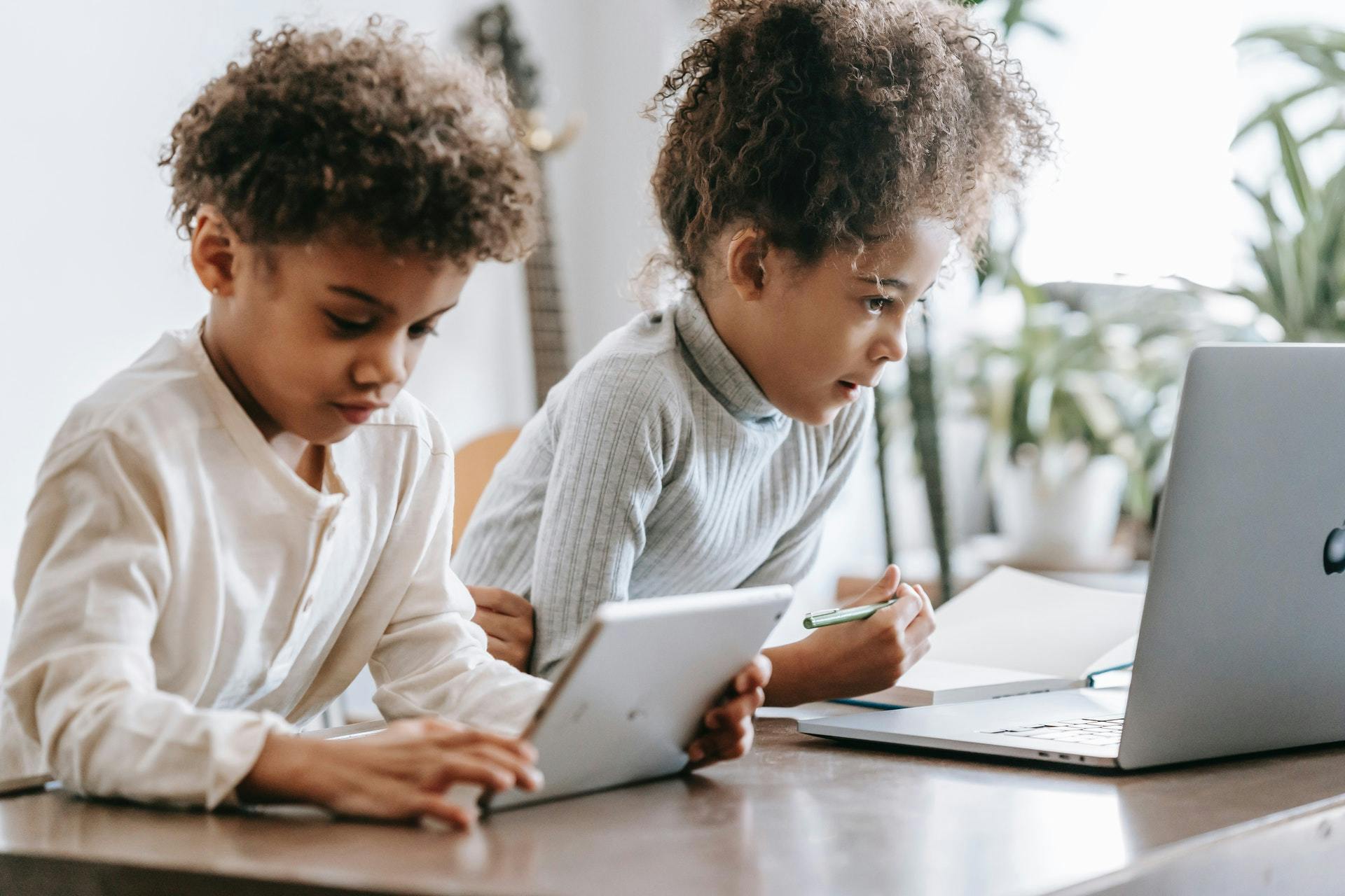 Two children play Prodigy and develop math confidence.